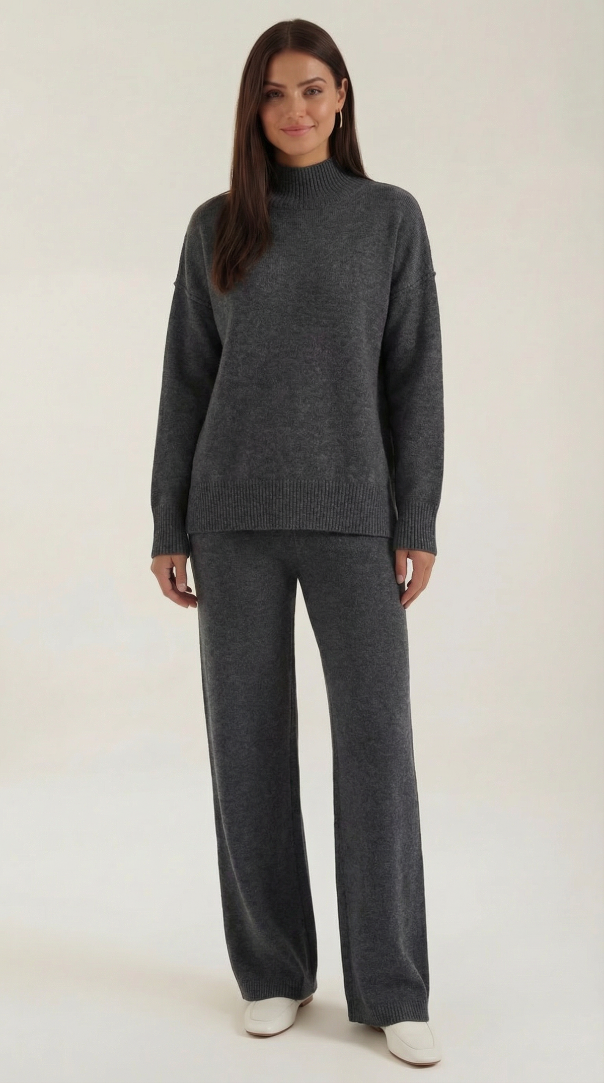 Conjunto de jersey de punto de cuello alto y pantalones vaqueros