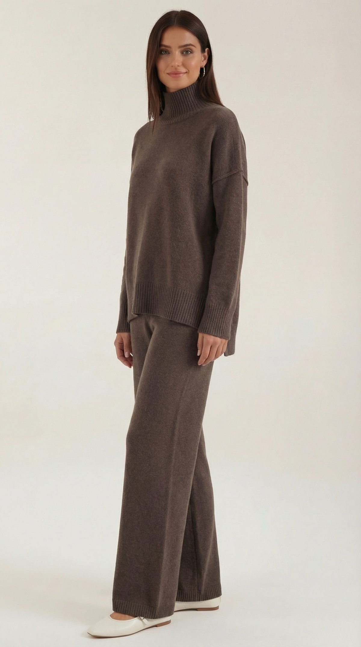 Conjunto de jersey de punto de cuello alto y pantalones vaqueros