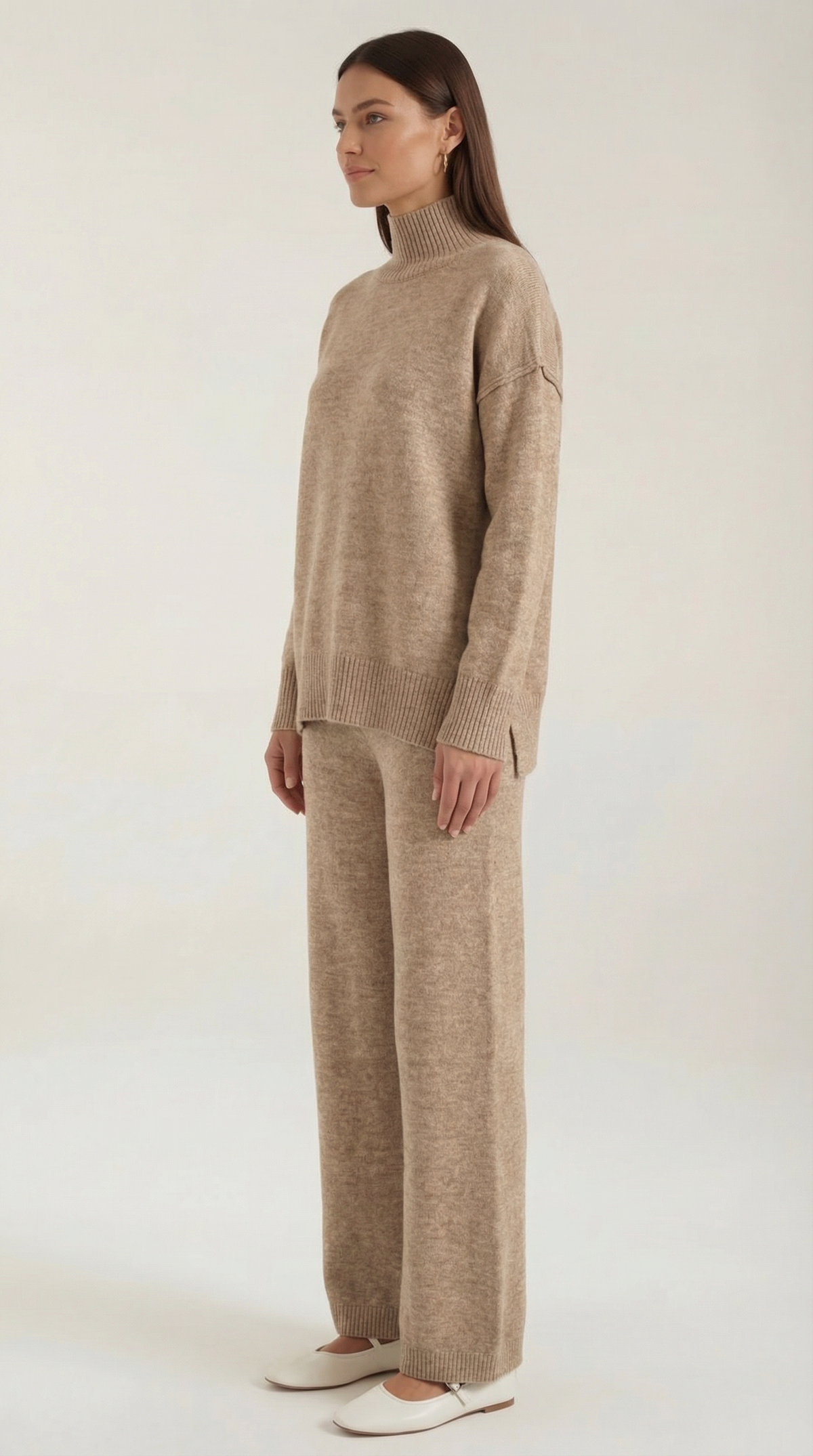 Conjunto de jersey de punto de cuello alto y pantalones vaqueros